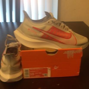 Nike sneakers brand orange and cream